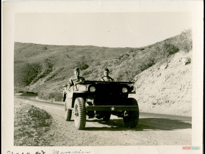 1943-01-04 Ojai CA with Col. Utterbach - 6,700 Ft. up, the road to Maricopa. This is the highest point and you can see the ocean and Catalina Islands. That is Col. Utterbach sitting with me.