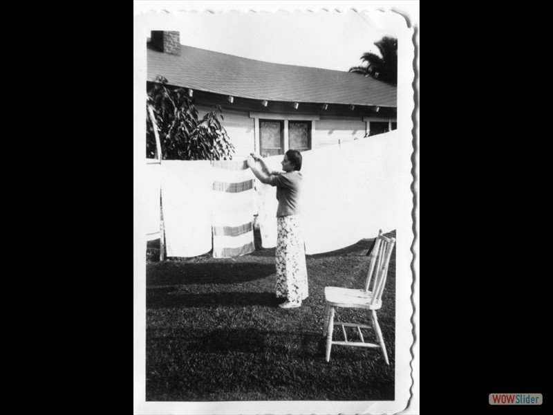 1942 California - Unknown woman hanging wash